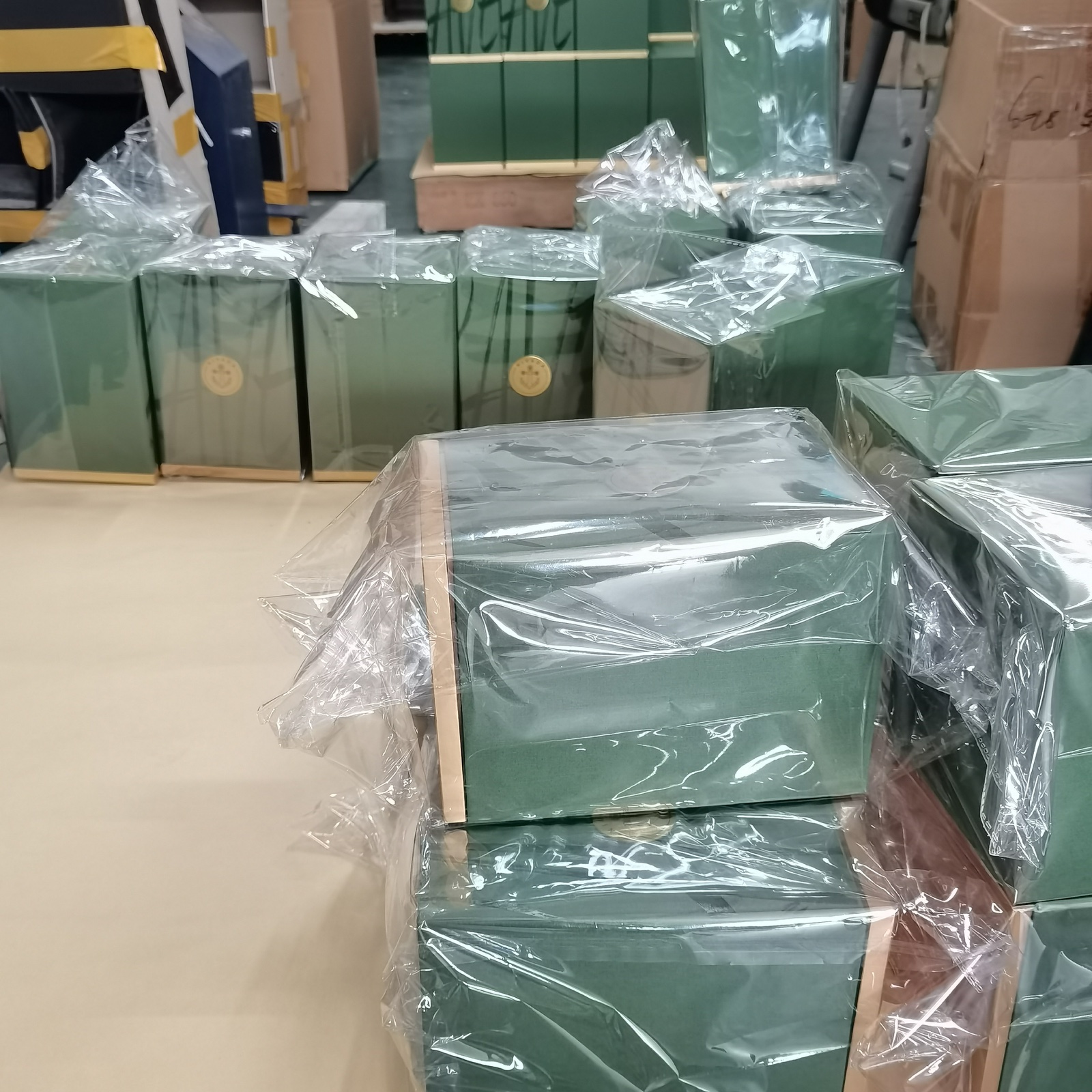 Finished watch presentation boxes individually protected before outer-carton packing